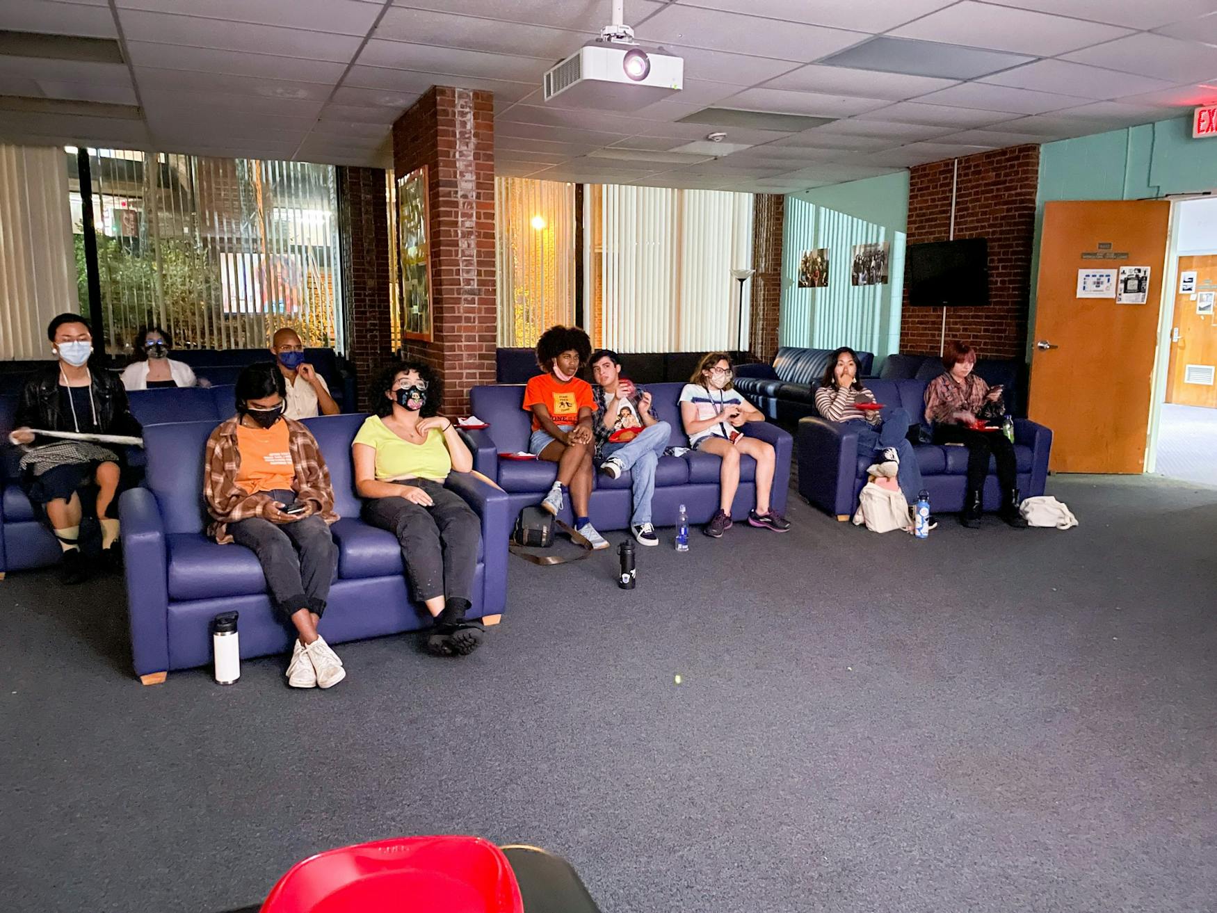 Students watch an episode of POSE at a Queer and Trans People of Color Coalition event on Sept. 25.