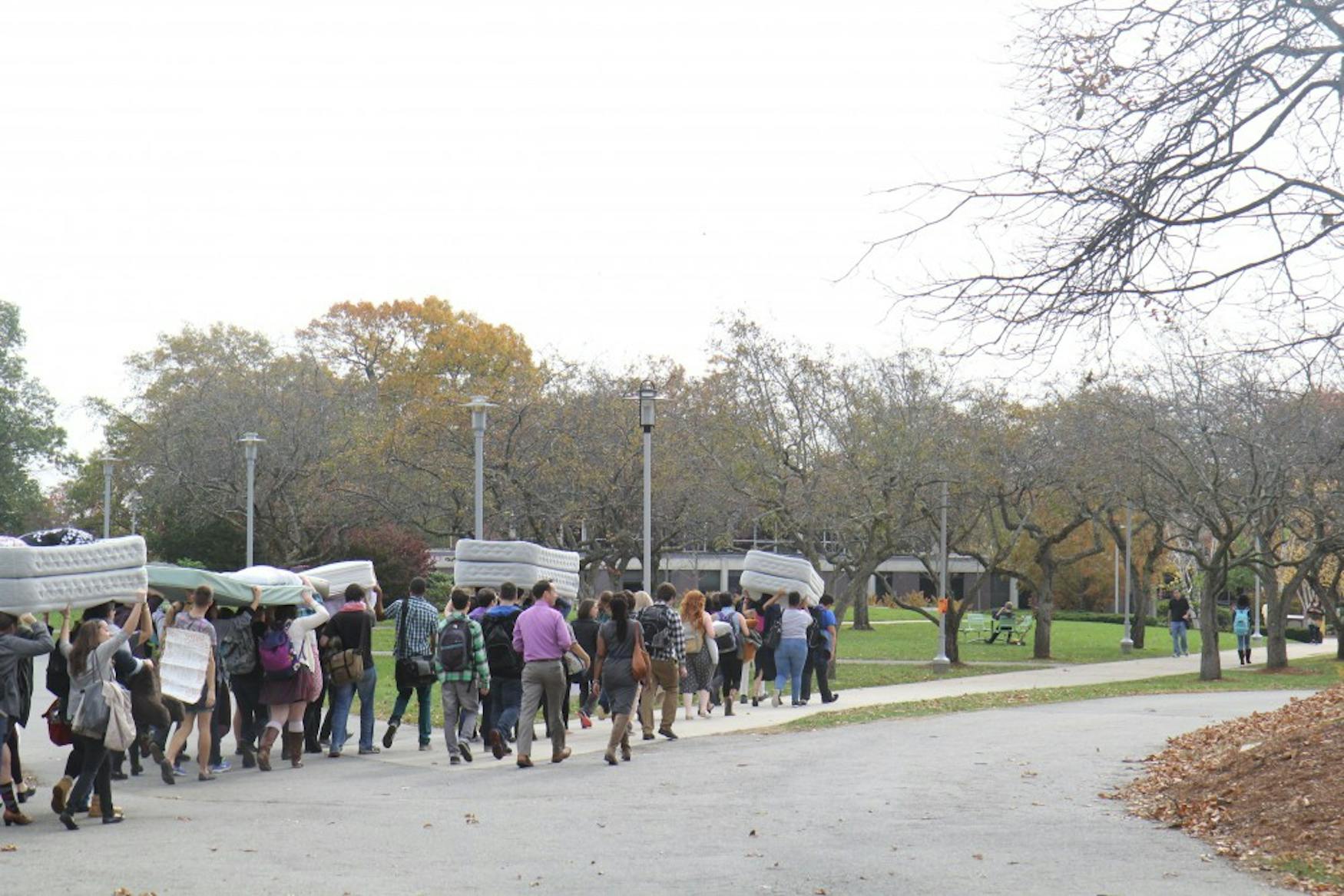 Students carried mattresses from the Rabb steps to Bernstein-Marcus Administration Center as a part of national day of action “Carry the Weight Together.”