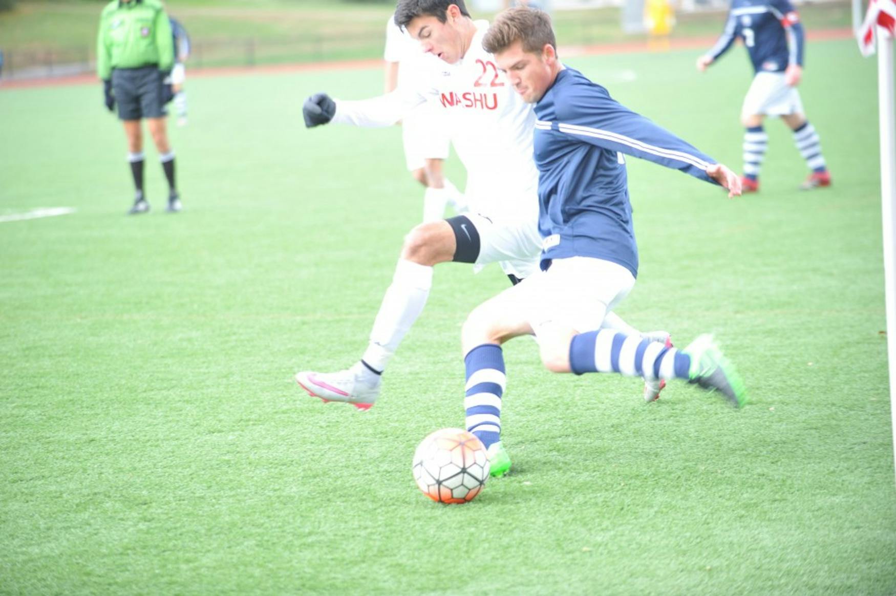 DIRECT PASS: Midfielder Josh Ocel ’17 reaches back for a strike during the squad’s 2-0 defeat to Washington University in St. Louis.