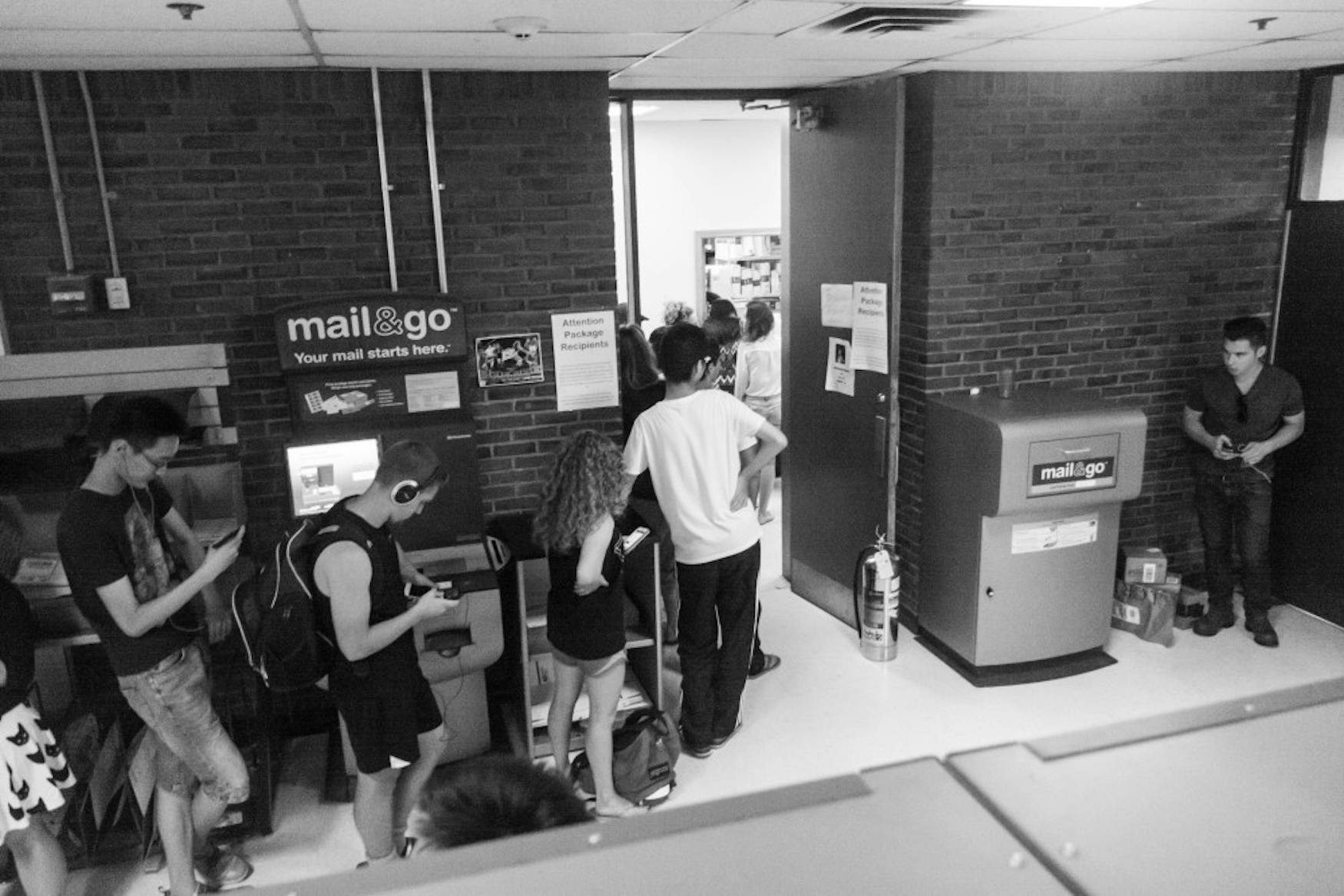 Students waited to pick up their deliveries and packages from the mailroom, run by Xerox, for about an hour on Sunday in the Usdan Student Center.