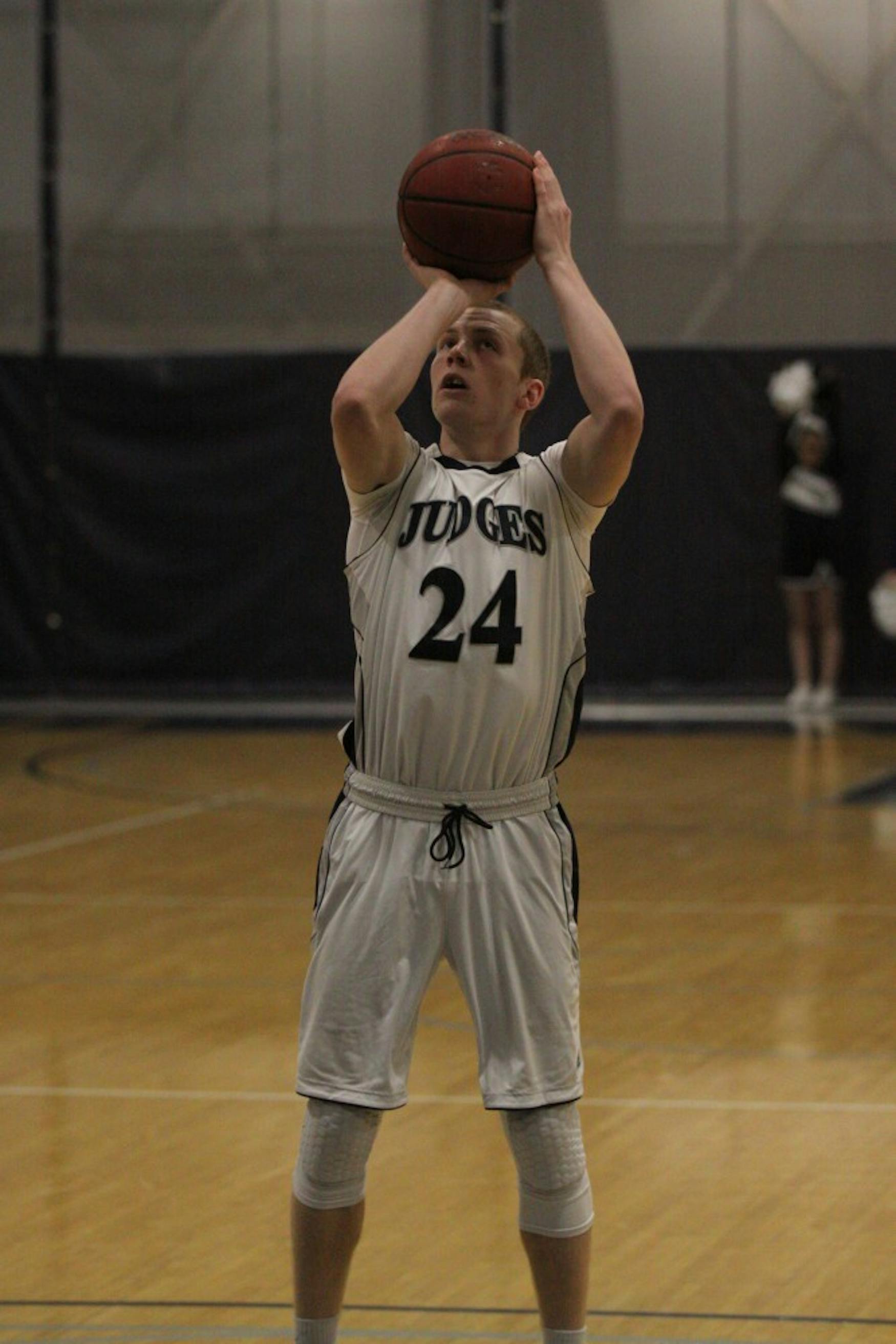 CLOSING TIME: Guard Nate Meehan ’18 takes a free throw in the Judges’ 65-51 loss against Emory University on Jan. 30.