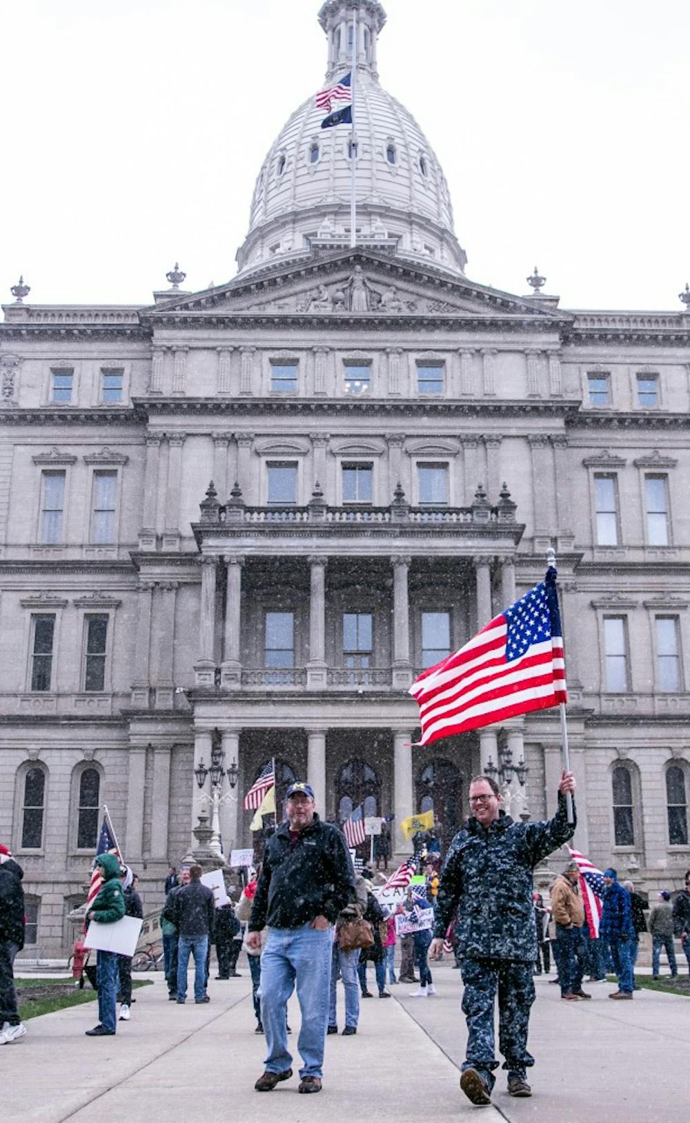 Protestors gather at the Capitol at the Operation Gridlock protest April 15, 2020 in Lansing.