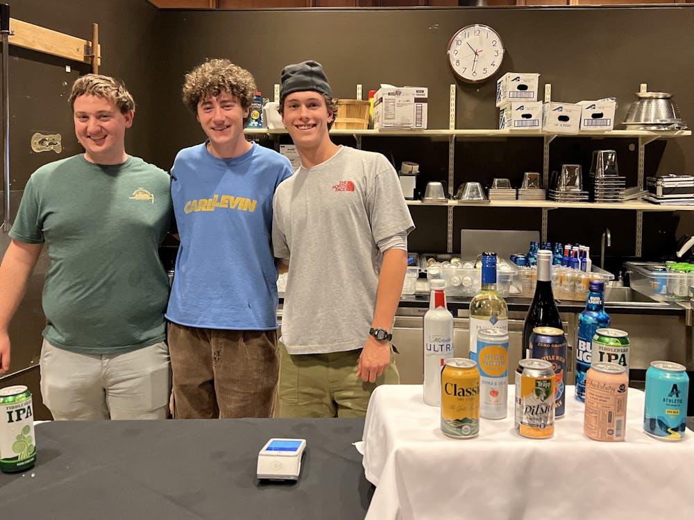 Seniors (left to right) Cody Mattice, William Fenimore and Ethan DeMaio practiced their bartending as student workers at Catamount. 