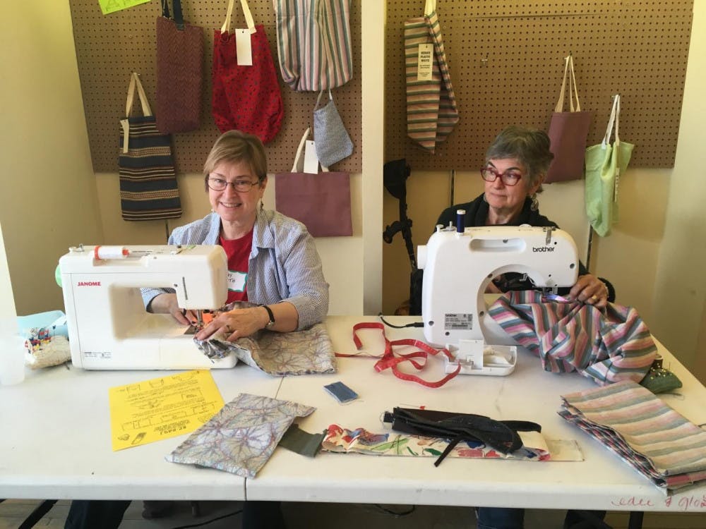 <span class="photocreditinline">Lucy Townend/The Middlebury Campus</span><br />Nancy (right) and Mary Beth (left) participate in the ReBag workshop at Bundle.