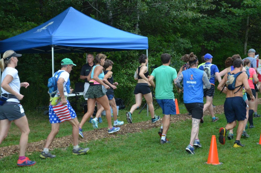<span class="photocreditinline">BENJY RENTON/THE MIDDLEBURY CAMPUS</span><br />TAM Trek runners set out on the trail.