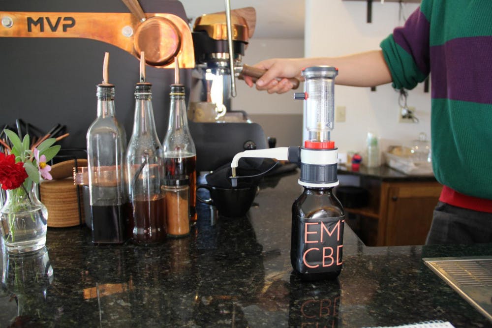<span class="photocreditinline"><a href="https://middleburycampus.com/43469/uncategorized/benjamin-glass/">BENJAMIN GLASS</a></span><br />Royal Oak Coffee uses CBD Oil from Elmore Mountain Therapeutics. Owner Matt Delia-Lôbo stressed that each cannabodiol dose is measured accurately and precisely with a graduated syringe (seen above).