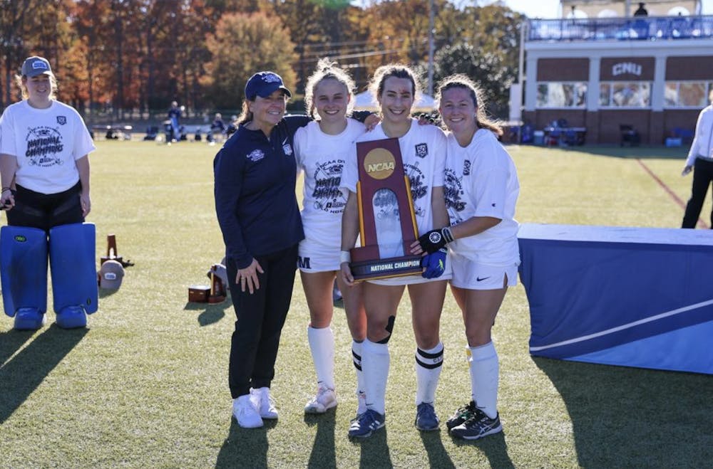 Audrey Lazar ‘23.5 (left), Katie George ‘23.5 (center), and Charlotte Marks ‘23.5 (right) won four national titles during their time with Middlebury Field Hockey.