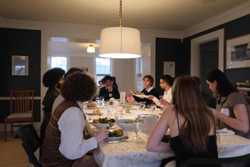 Students gather at 3 South Street to discuss political beliefs over dinner.