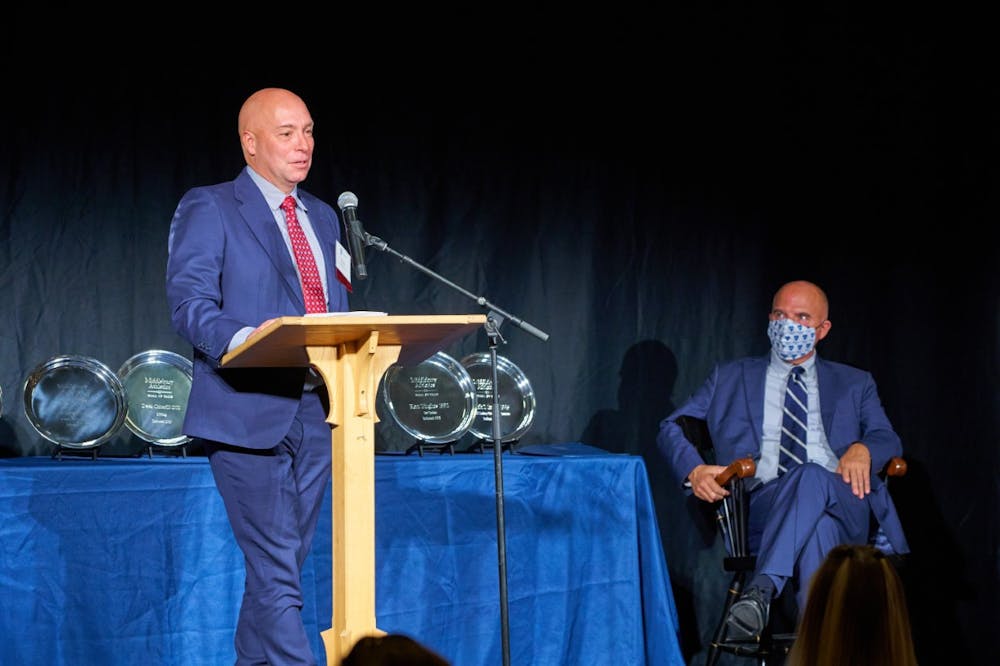 <p>Kent Hughes ’92 is Middlebury hockey’s all-time leader in assists (140) and points (194) in a career. Last fall, he was inducted into the Athletics Hall of Fame. (Courtesy of Todd Balfour)</p>