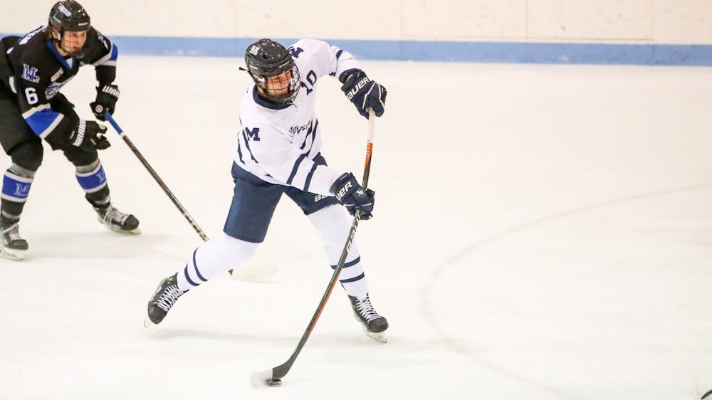 Reece Brednich '28 takes a shot on goal.