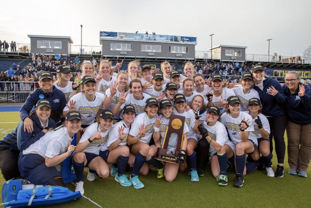 Athletic photographer Will Costello took this photo after the Middlebury field hockey team won the NCAA Championship in 2021.
