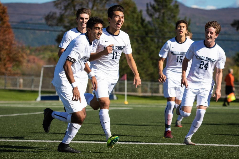 <span class="photocreditinline">MICHAEL BORENSTEIN/THE MIDDLEBURY CAMPUS</span><br />Ben Potter ’20 (#11) celebrates with his teammates after scoring a goal against Bates on Oct. 20.