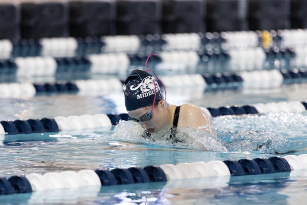 Maggie Reynolds ’24 takes a breath during the breaststroke.