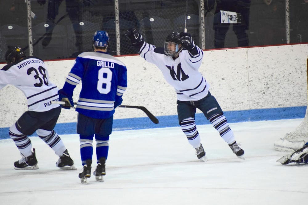<span class="photocreditinline">BENJY RENTON/THE MIDDLEBURY CAMPUS</span><br />Alex Heinritz ’21 scored a goal in the second period against Colby on Friday, Jan. 18.