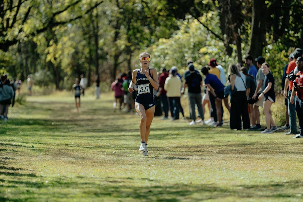 Audrey Maclean '27 down the home stretch at the Paul Short invitational.