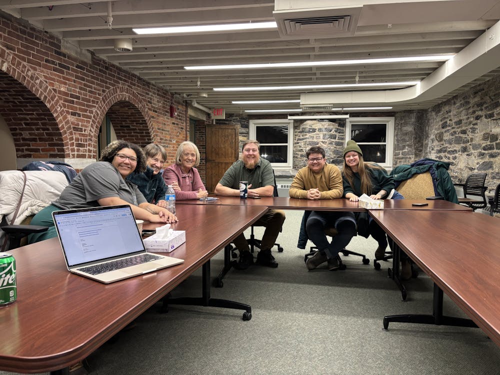 Members of the True Crime Podcast Club convene in Mini-Isley to discuss a case.