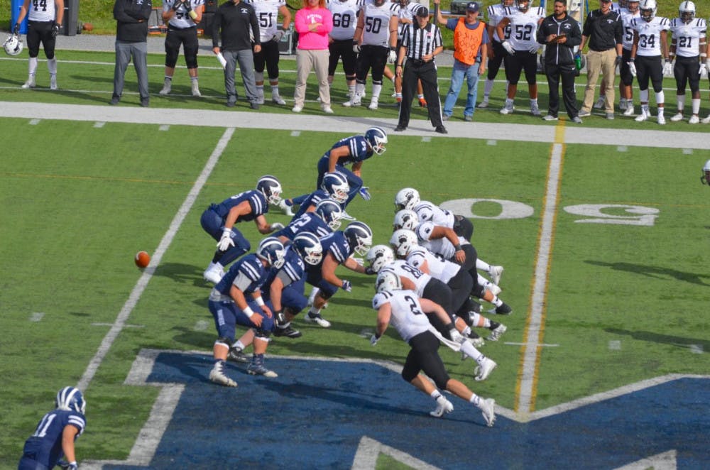<span class="photocreditinline"><a href="https://middleburycampus.com/39367/uncategorized/benjy-renton/">BENJY RENTON</a></span><br />The Panthers' offensive line faces off against the Bowdoin Polar Bears on Sept. 22.