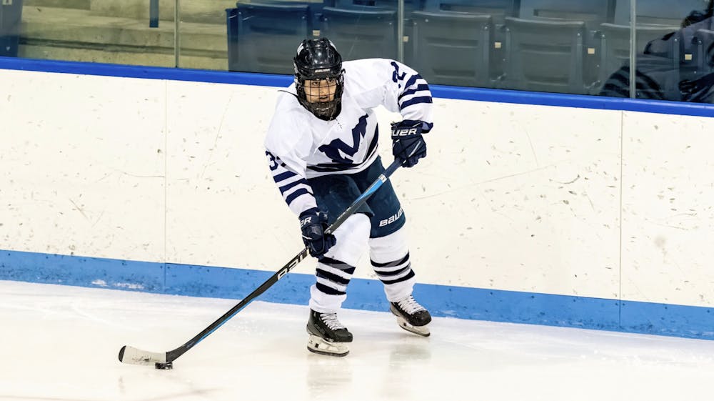 Kylie Quinlan '25 scored the game-winning shot against rival Williams in overtime of the quarterfinals. 