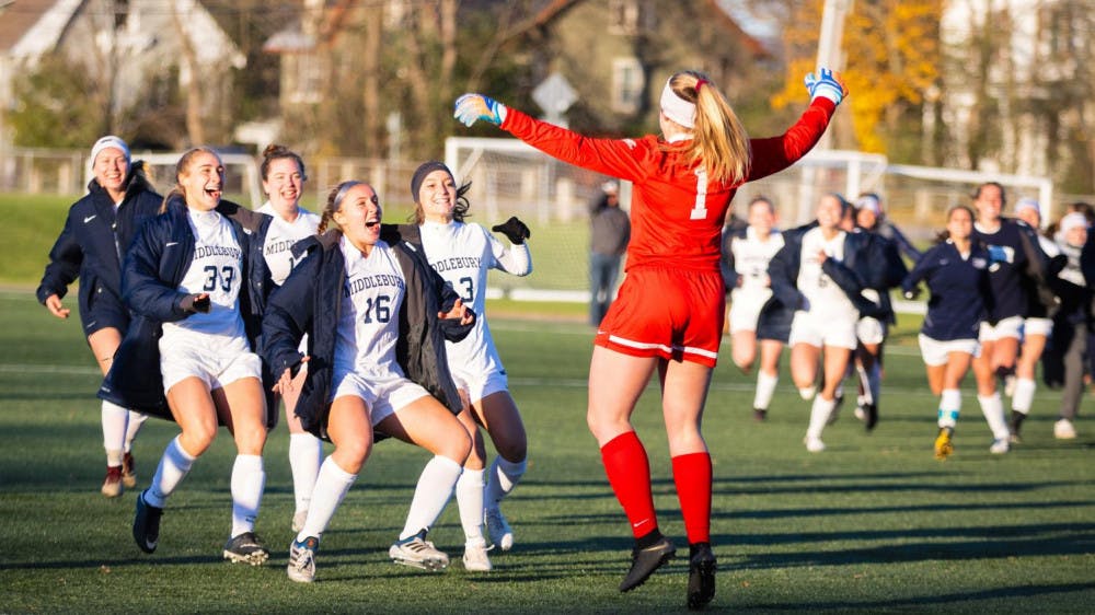 <span class="photocreditinline">MICHAEL BORENSTEIN/THE MIDDLEBURY CAMPUS</span><br />The Panthers, led by Sarah DiCenso ’19, storm the field after advancing in the NCAA Tournament.