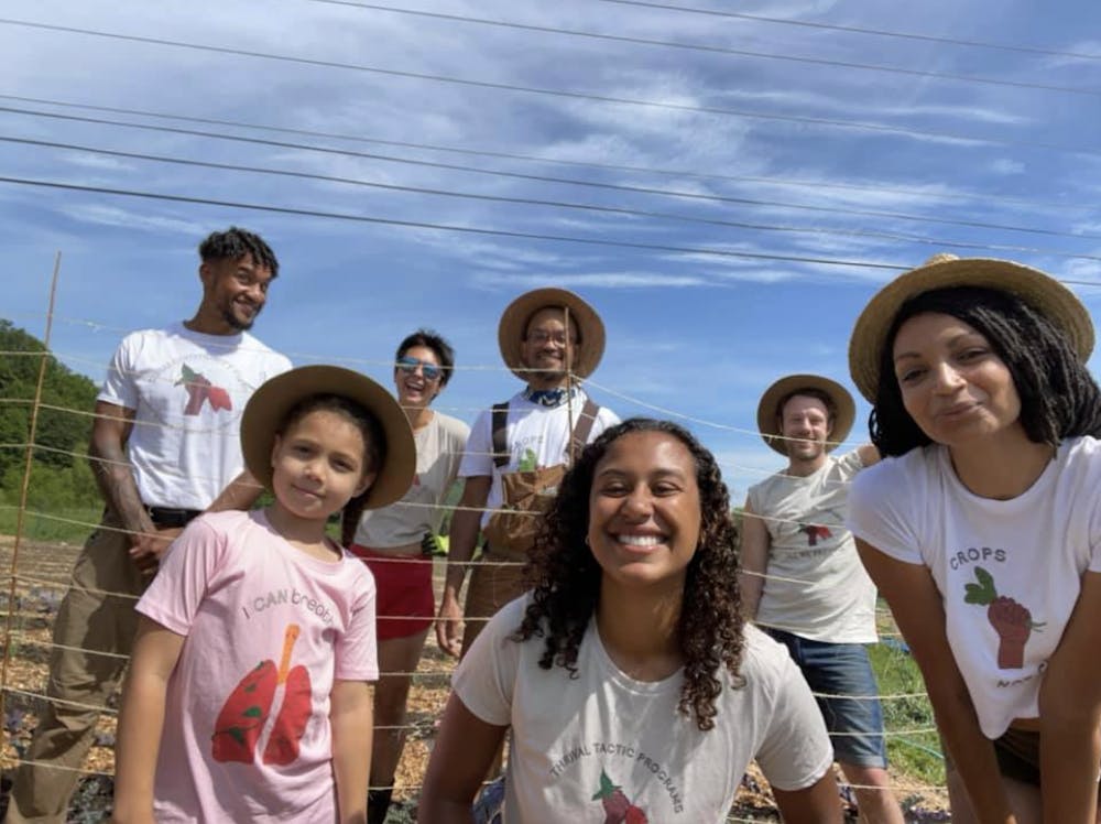 Photo at the farm which includes the two founders, Amber Arnold and Naomi Doe Moody.