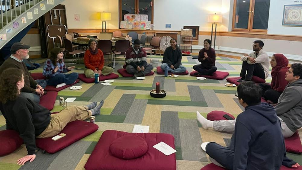 Students and faculty gather in Crest Room for weekly meditation.
