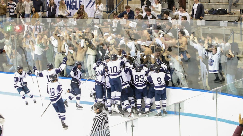 The student section goes wild during Middlebury's dramatic comeback victory.