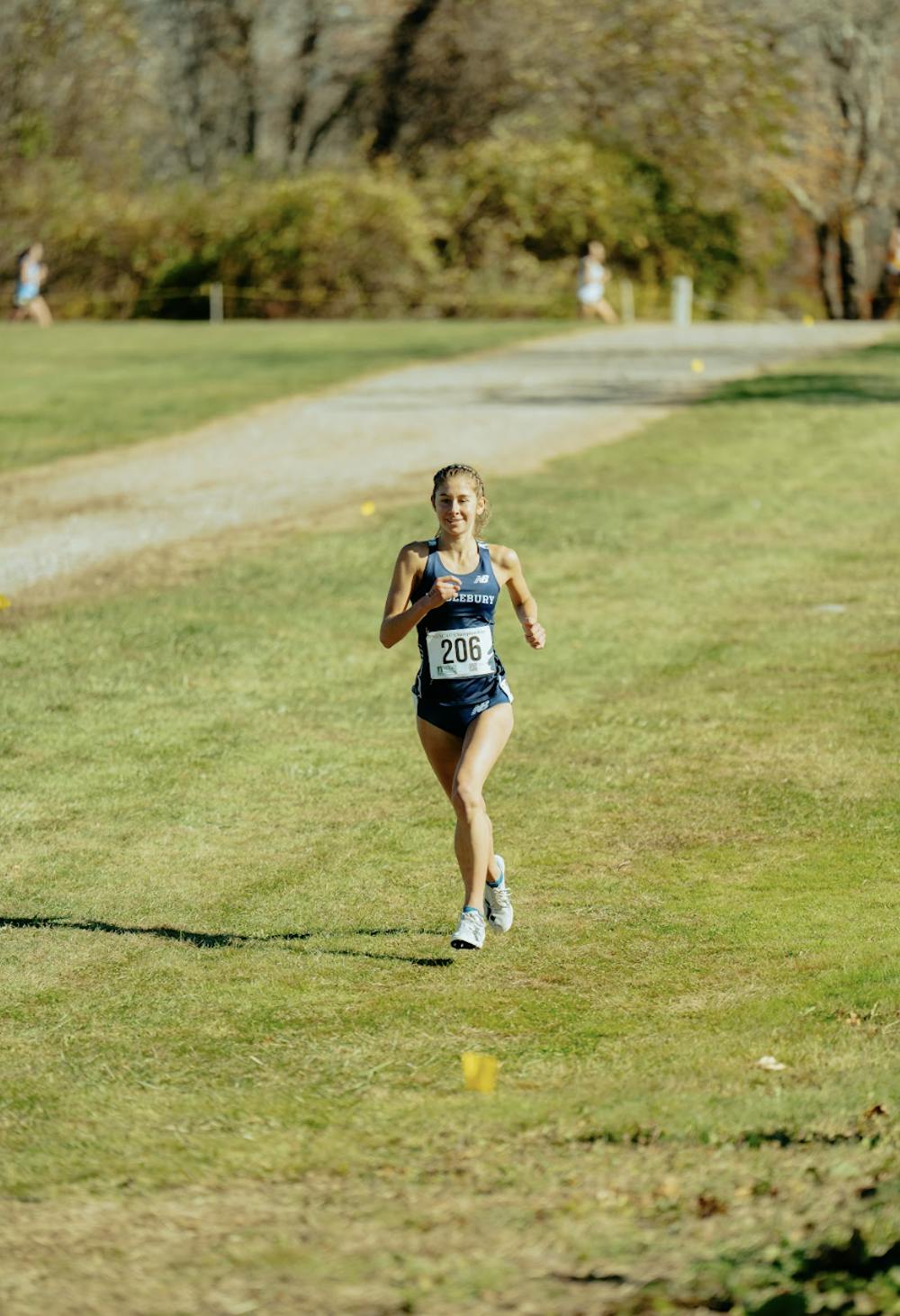 Audrey MacLean '27 gapping the field.