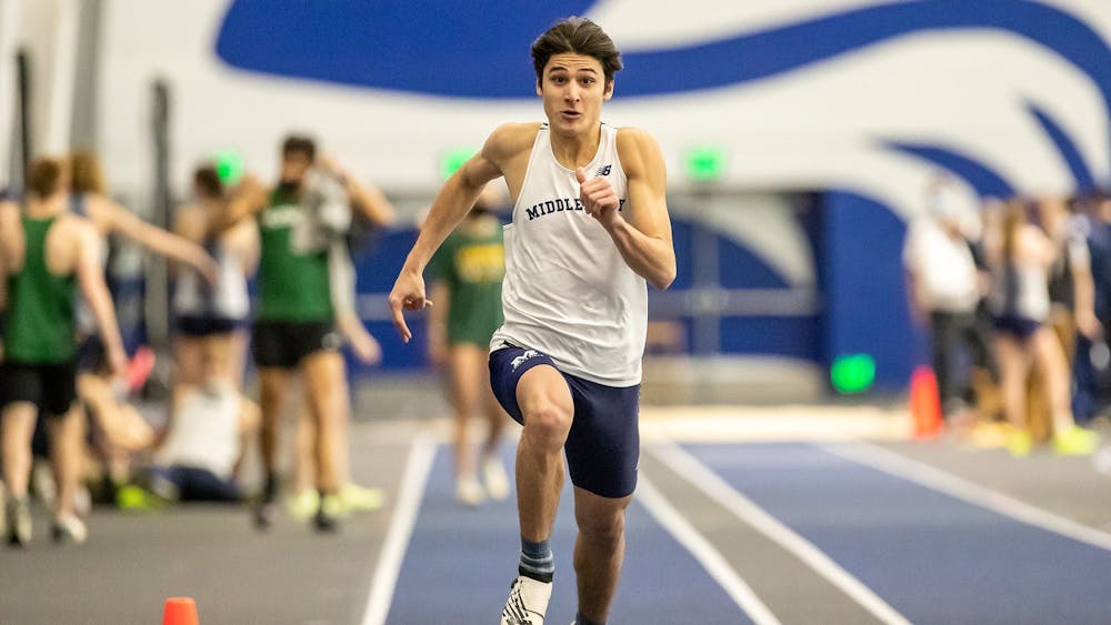 Santi Canella ’25 sprints forward in the triple jump during the Middlebury Winter Classic on Jan. 15. (Courtesy of Middlebury Athletic Communications)
