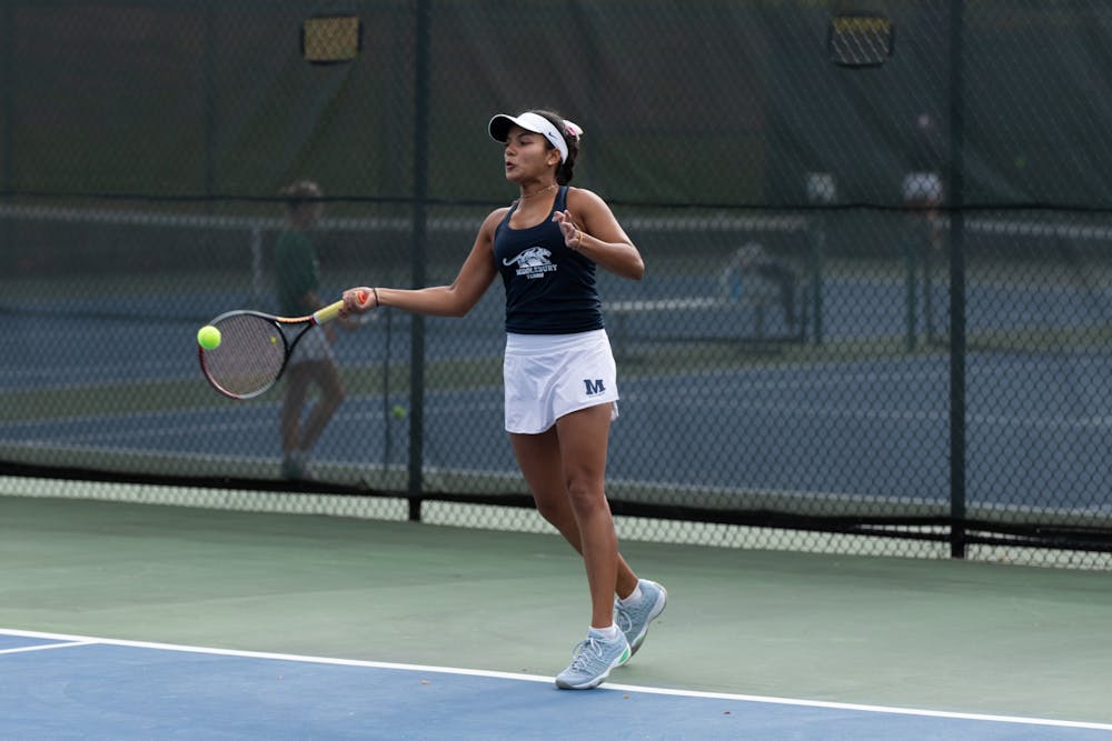 Sahana Raman ’25 hits a forehand at Middlebury’s new tennis facility. 