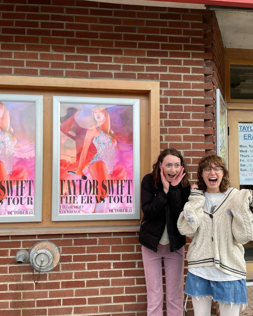 Acadia Klepeis '24 and Kristen Morgenstern '24 attend the premiere of "Taylor Swift: The Eras Tour" at the Middlebury Marquis.