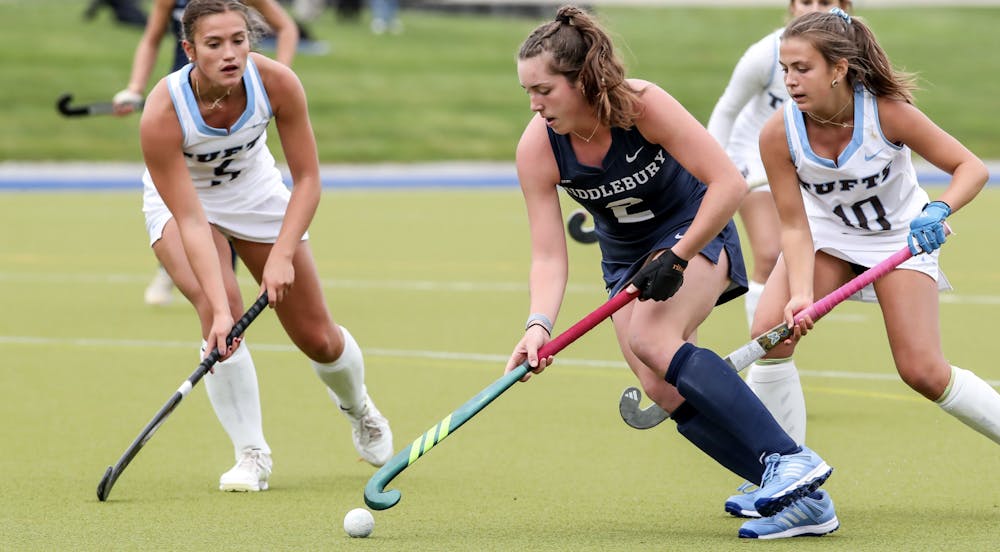 Emma McCann '28 in a crowd of Jumbos.