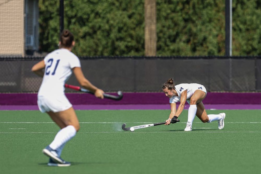 Charlotte Marks ’23.5 plays in a field hockey game this past season