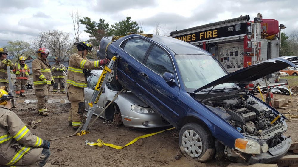 <span class="photocreditinline">Courtesy Photo/ David Cohen</span><br />Members of MFD and MREMS, stabilize and extricate an “underride” during an advanced extrication class taught by members of Middlebury EMS Heavy Rescue Team as part of the Addison County Fire School.