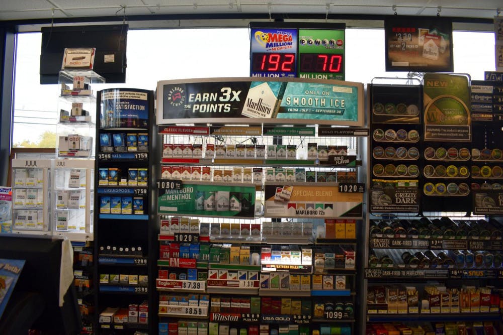 <span class="photocreditinline"><a href="https://middleburycampus.com/43248/uncategorized/max-padilla/">MAX PADILLA</a></span><br />A display at Mobil gas station in the town of Middlebury offers tobacco and e-cigarette products, which are now no longer available for purchase for customers under 21 years old.
