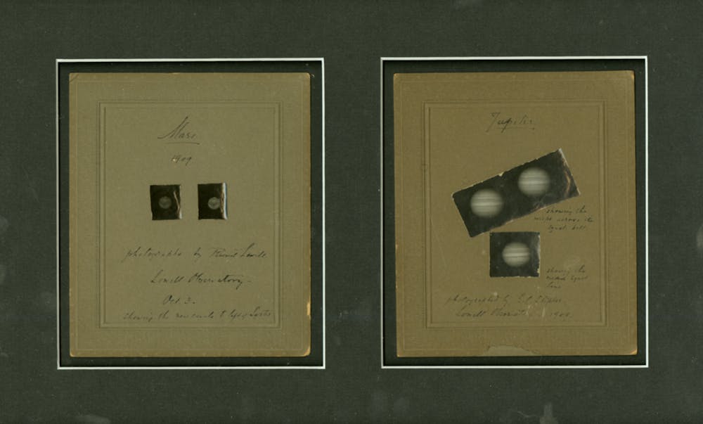 Mars : 1909 / photographs by Percival Lowell. Jupiter / photograph by E.C. Slipher.