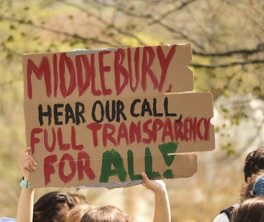 A protestor during the May 3 rally at Old Chapel calling for Middlebury to disclose its connections to the war in Gaza.