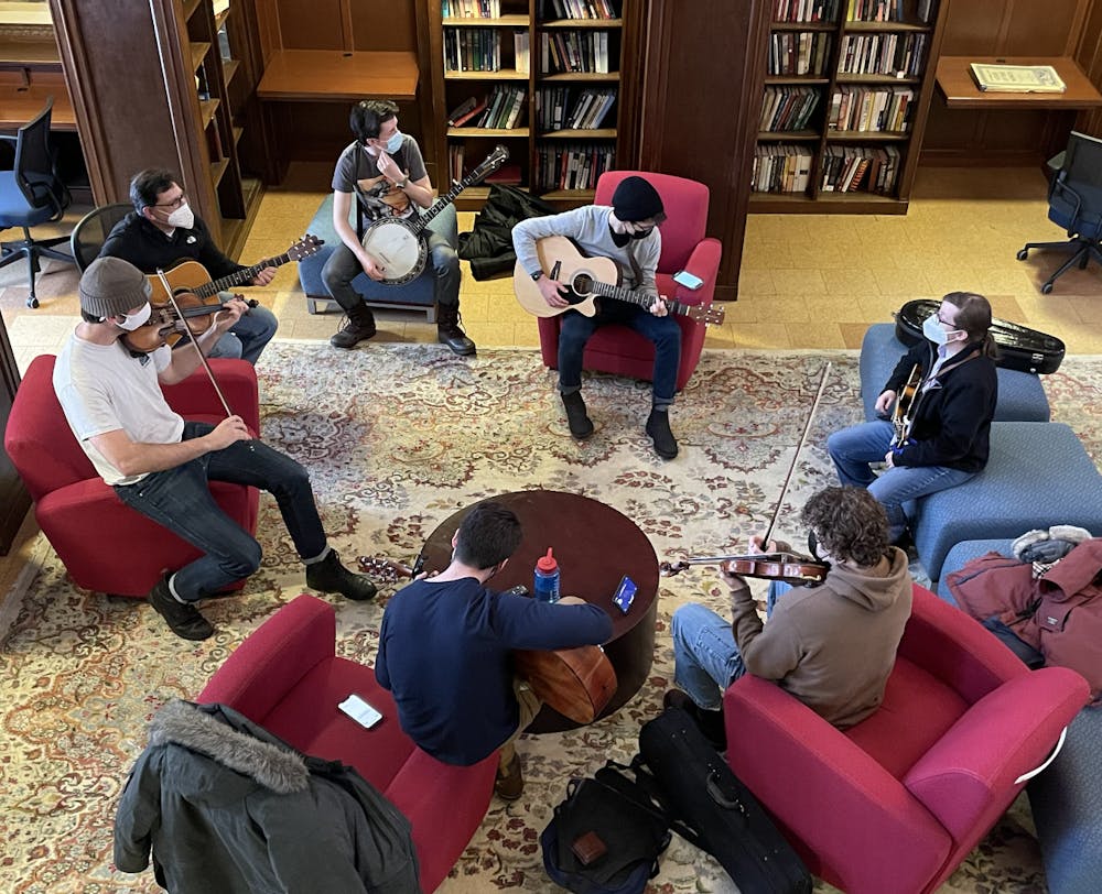 Middlebury Bluegrass Jam convenes in the Abernathy Room for an afternoon jam session.
