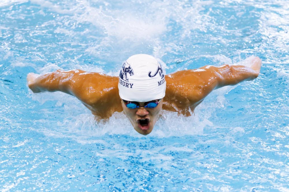 <span class="photocreditinline">MICHAEL BORENSTEIN/THE MIDDLEBURY CAMPUS</span><br />Nick Handali ’20 sprints to the finish in the 100-yard butterfly during the meet against Bates on Jan. 13.