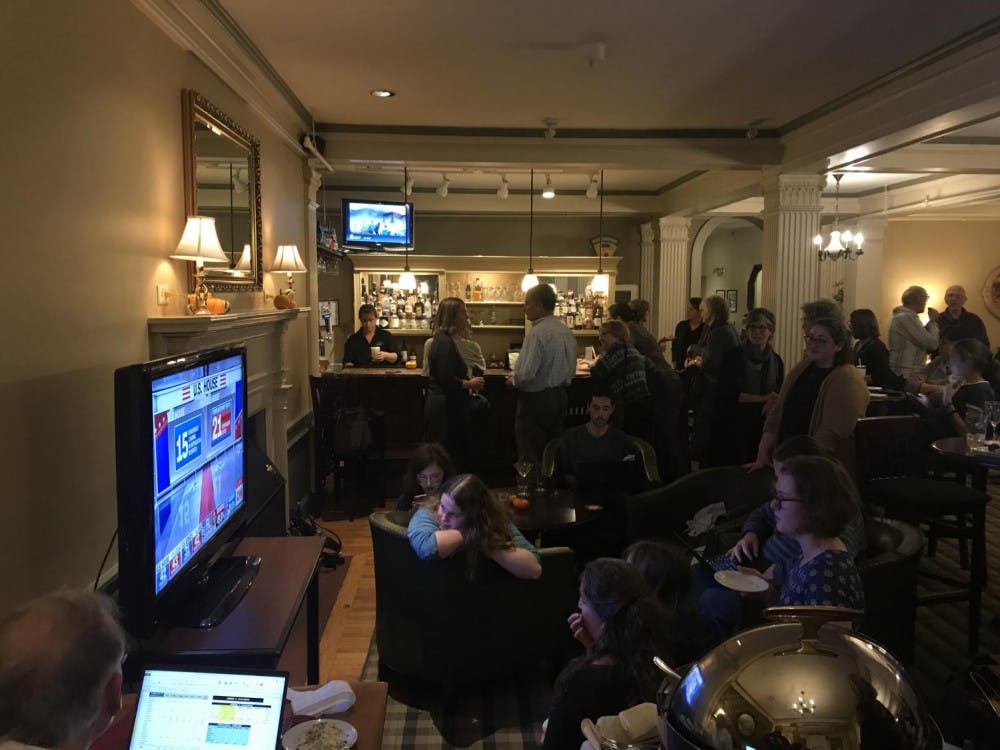 <span class="photocreditinline"><a href="https://middleburycampus.com/35881/uncategorized/amelia-pollard/">AMELIA POLLARD</a></span><br />Addison Dems hosted an election party at the Middlebury Inn. Residents gathered to watch local and national results in the lobby