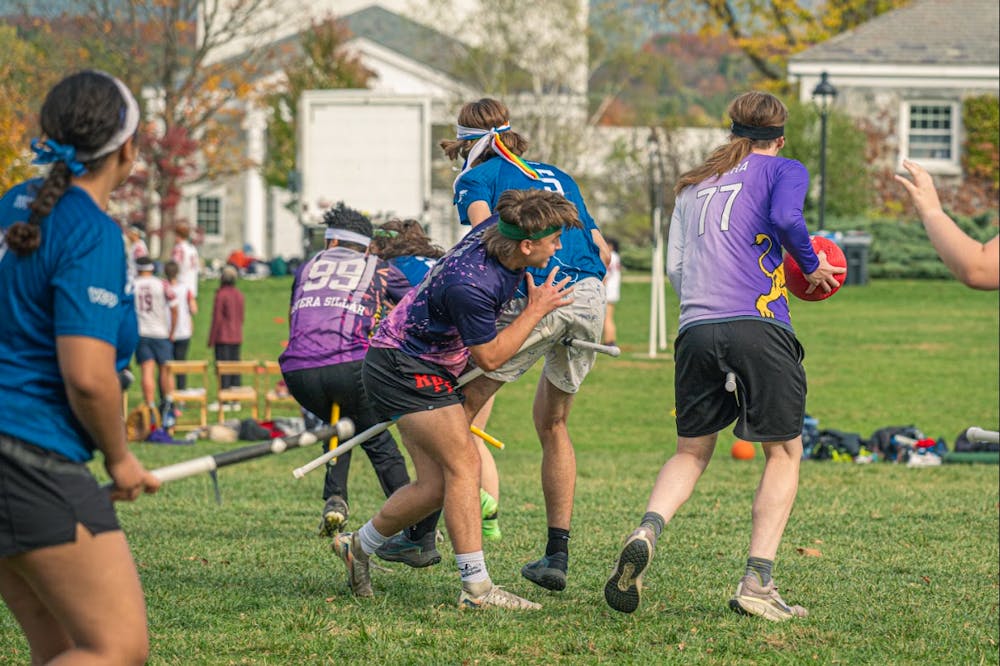 Middlebury Chasers fight for possession of the Quaffle.