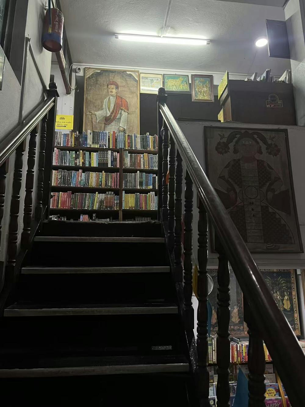Art-filled stairway in Pilgrims Book House, Kathmandu.