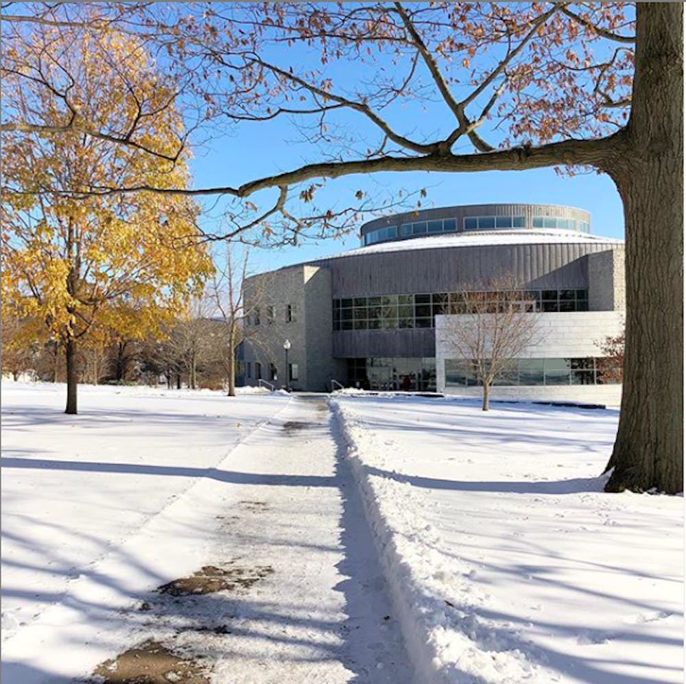 <span class="photocreditinline"><a href="https://middleburycampus.com/staff_profile/benjy-renton/">BENJY RENTON</a></span><br />Davis Family Library after the first snow of the winter as students began to review the Winter Term course offerings, unique classes that undergo a complicated approval process.