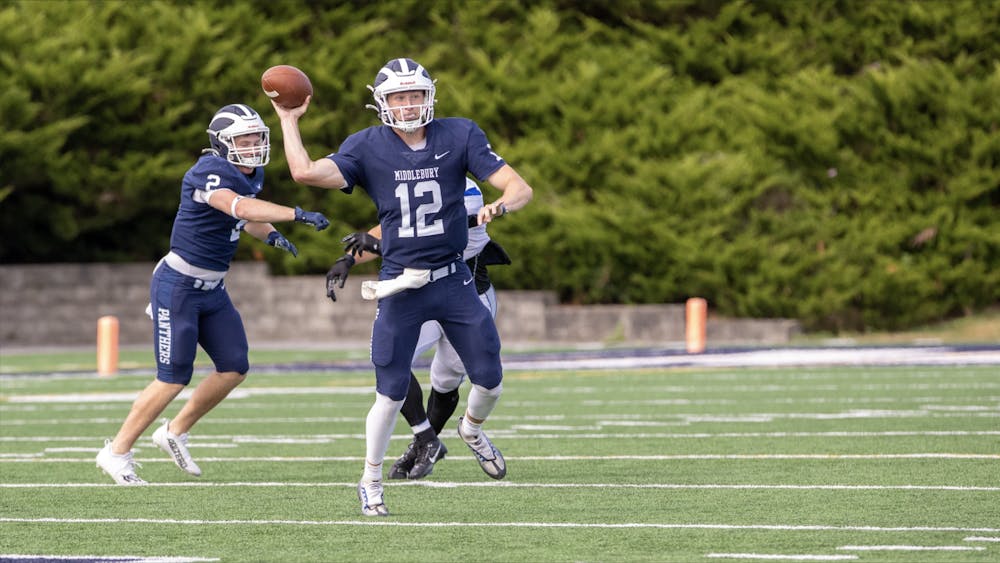 Brian Moran ’24 throws a pass during Middlebury’s parents weekend win over Colby.