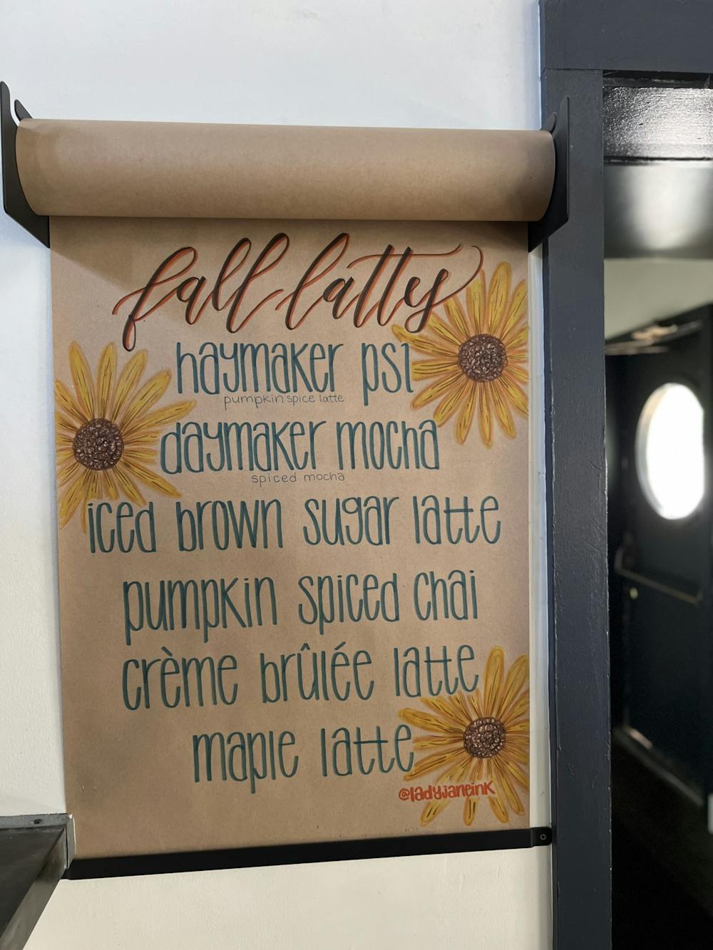 Caitlin Sausville's lettering is currently on display at Haymaker Bun Company.