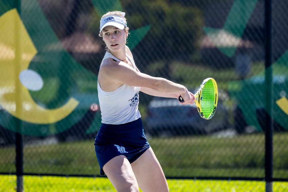 Senior Co-Captain Nina Farhat ’25 won both her doubles and singles match against Connecticut College at home this past weekend.