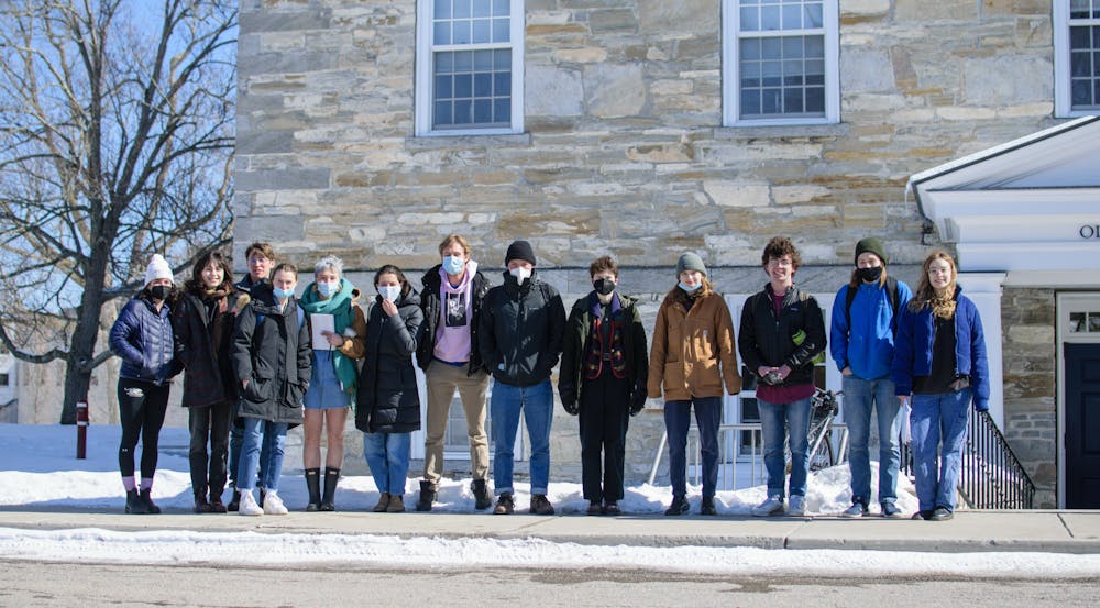 <p>Student organizers gather outside of Old Chapel.</p>