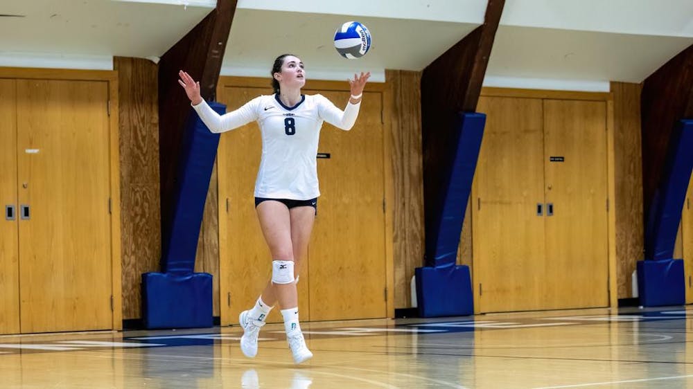 Molly Harrison ’27 serves during Middlebury’s 3-0 win over Saint Michael’s College.