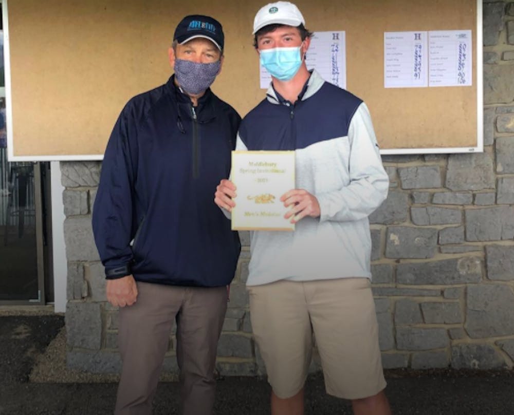 <span class="photocreditinline">Courtesy: Middlebury Athletics</span><br />Bill Beaney (left) poses with Hogan Beazley (right) after Middlebury’s home golf meet on Saturday, May 8.