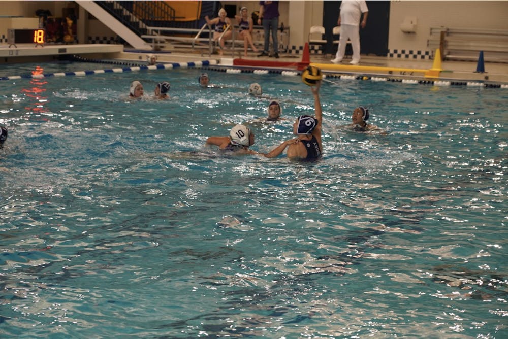 Middlebury Women’s Water Polo on an offensive run during the 2022 Division Championship.