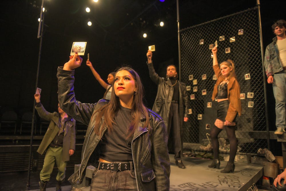 <p>During the final scene of “Polaroid Stories”, actors held up Polaroid photos to represent those who have fallen through the cracks of society in one way or another.</p>